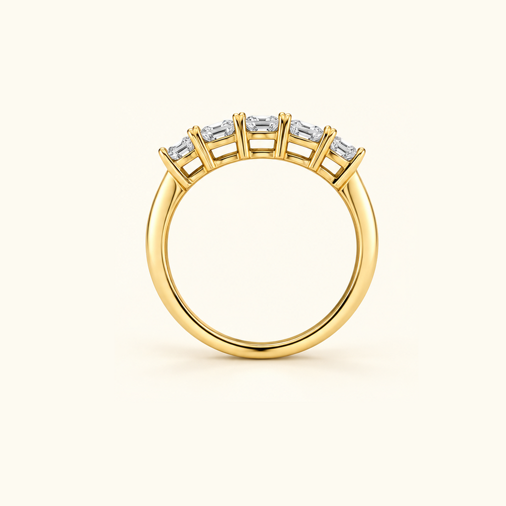 Edge view of Cadence, a five-stone band in 14K yellow gold with five emerald diamonds
variant: yellow-gold