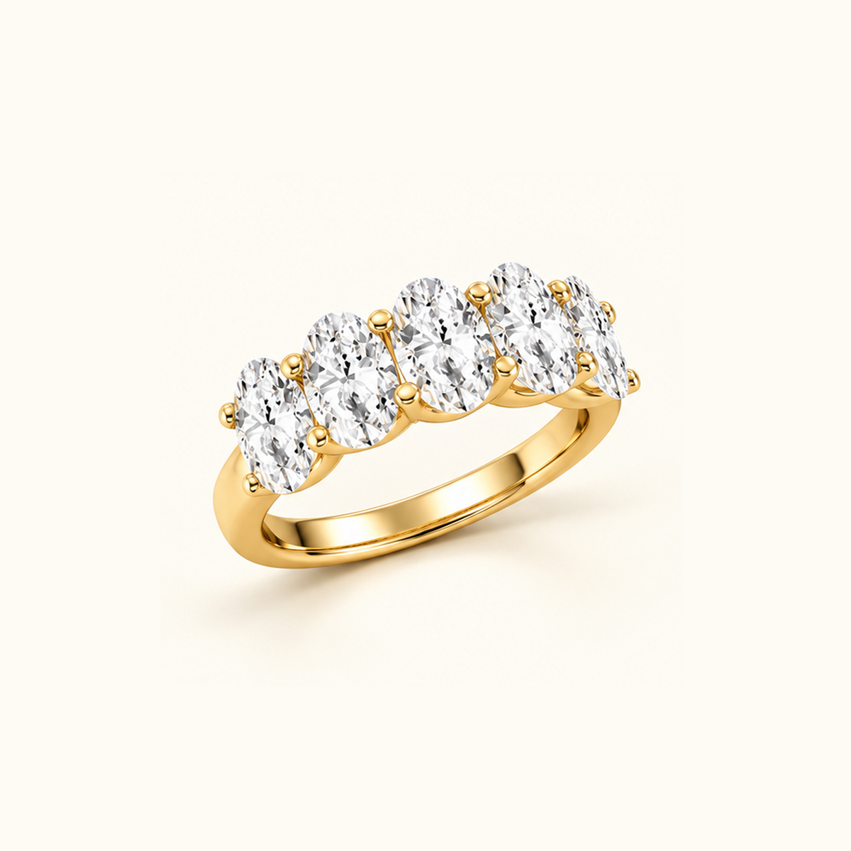 Cadence at an angle, a five-stone band in 14K yellow gold with five oval diamonds
variant: yellow-gold