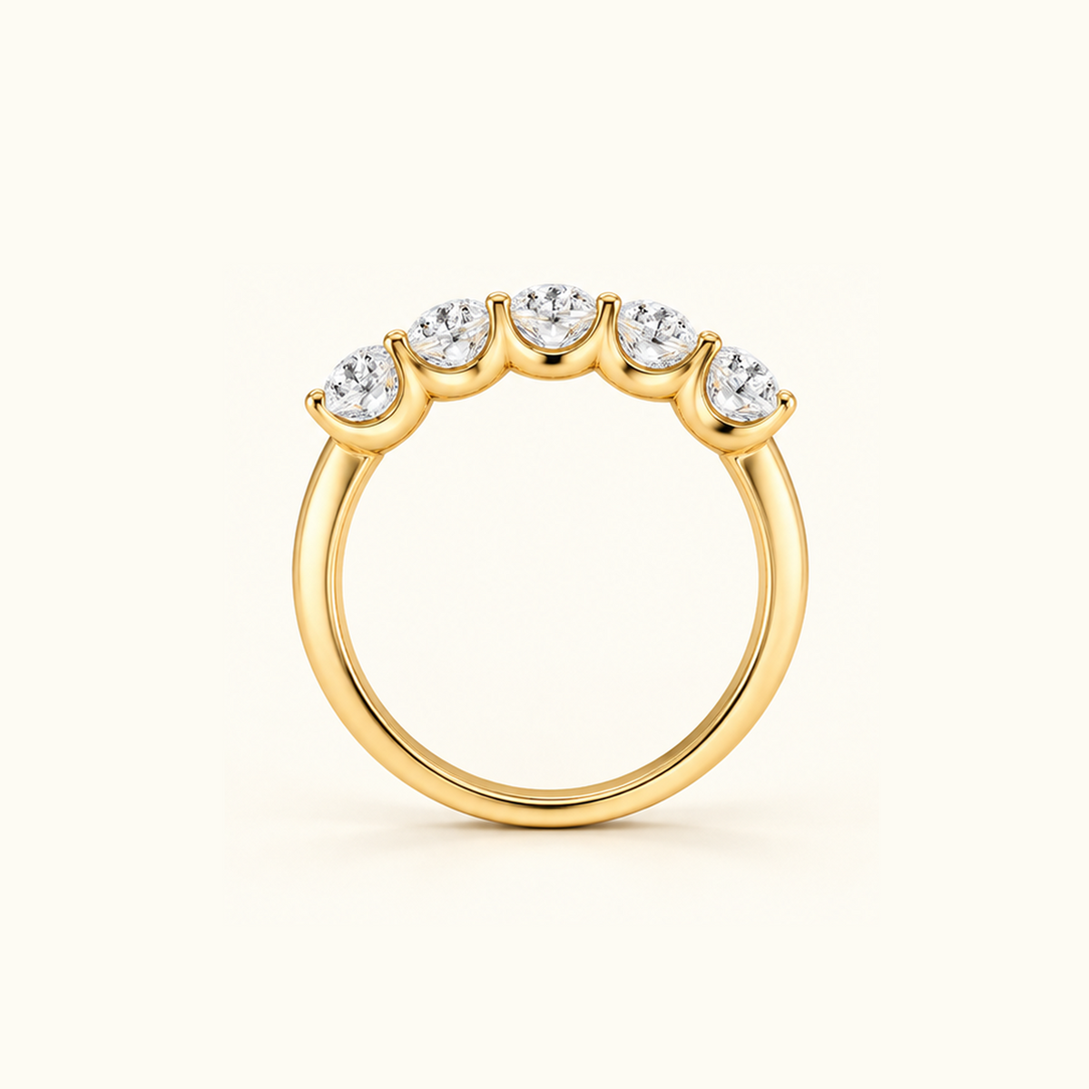 Edge view of Cadence, a five-stone band in 14K yellow gold with five oval diamonds
variant: yellow-gold