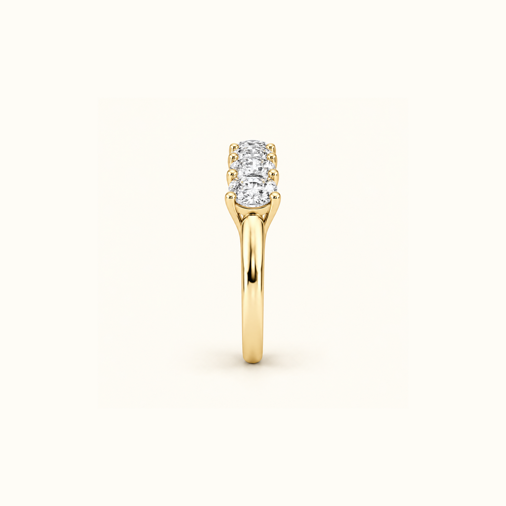 Side view of Cadence, a five-stone band in 14K yellow gold with five oval diamonds
variant: yellow-gold