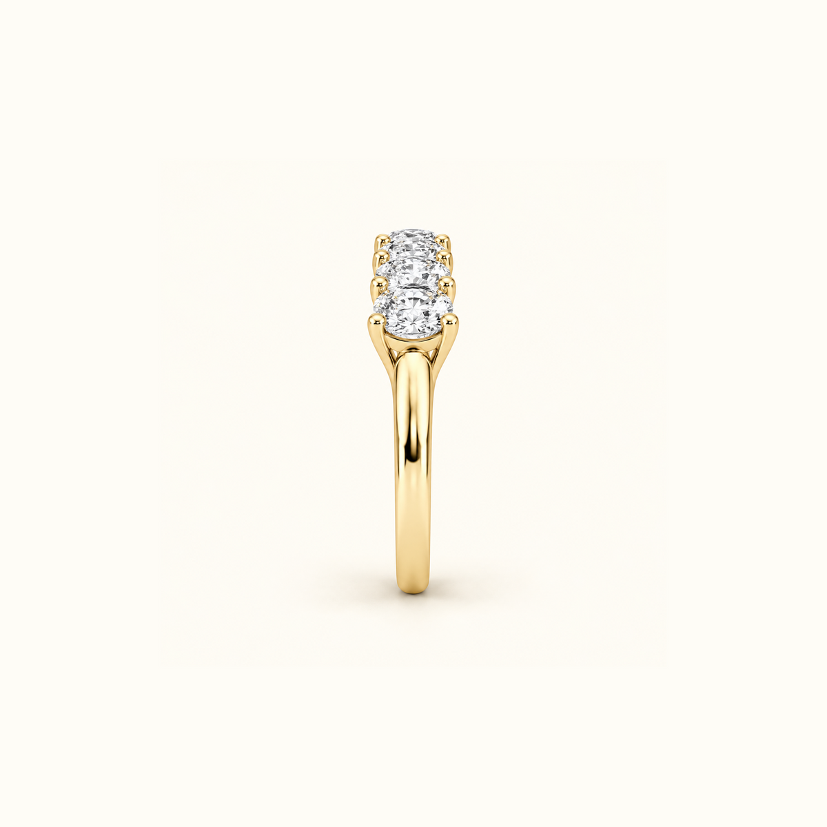 Side view of Cadence, a five-stone band in 14K yellow gold with five oval diamonds
variant: yellow-gold