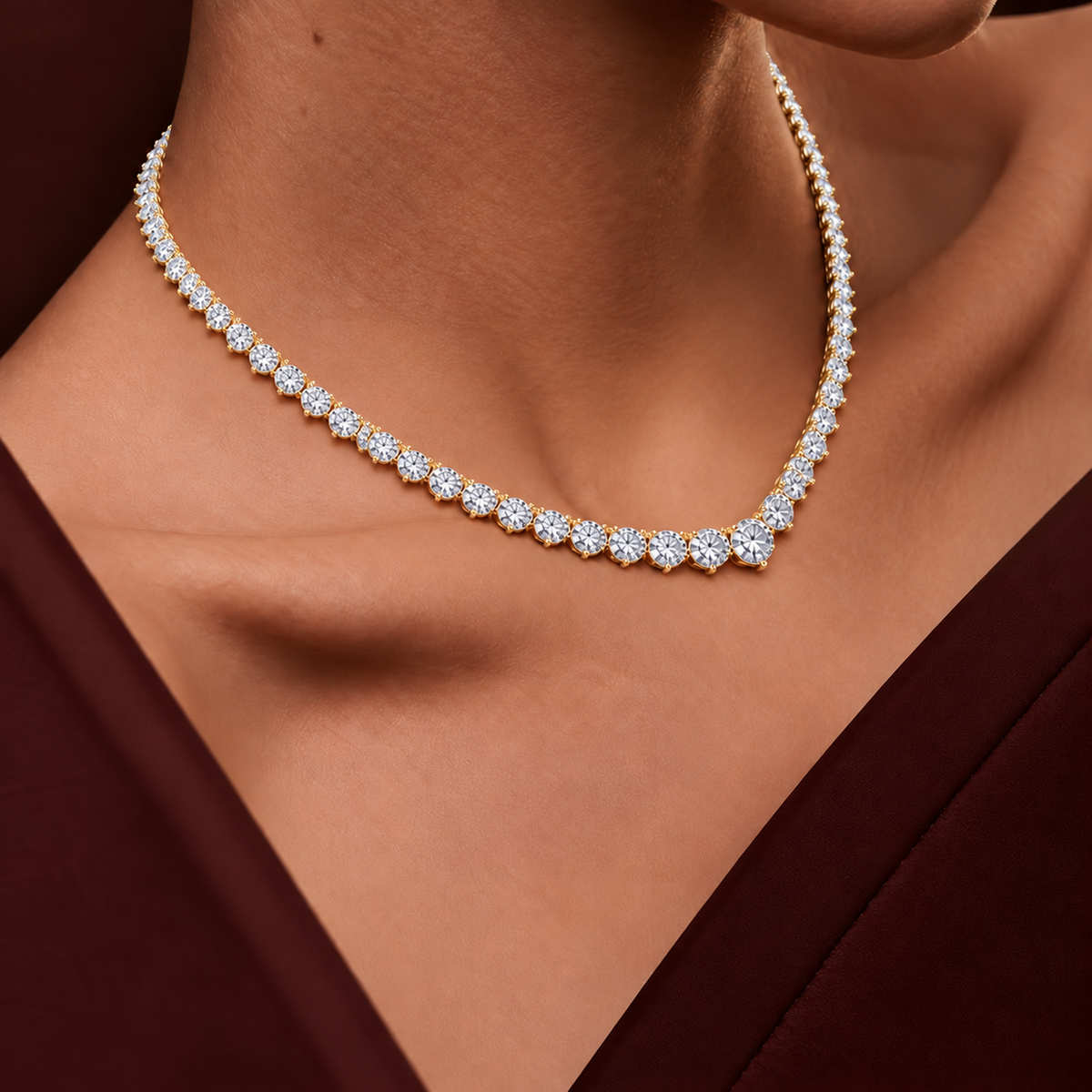Cascade Tennis Necklace in 14K yellow gold worn at the collarbone, the largest diamonds resting at the center
variant: yellow-gold