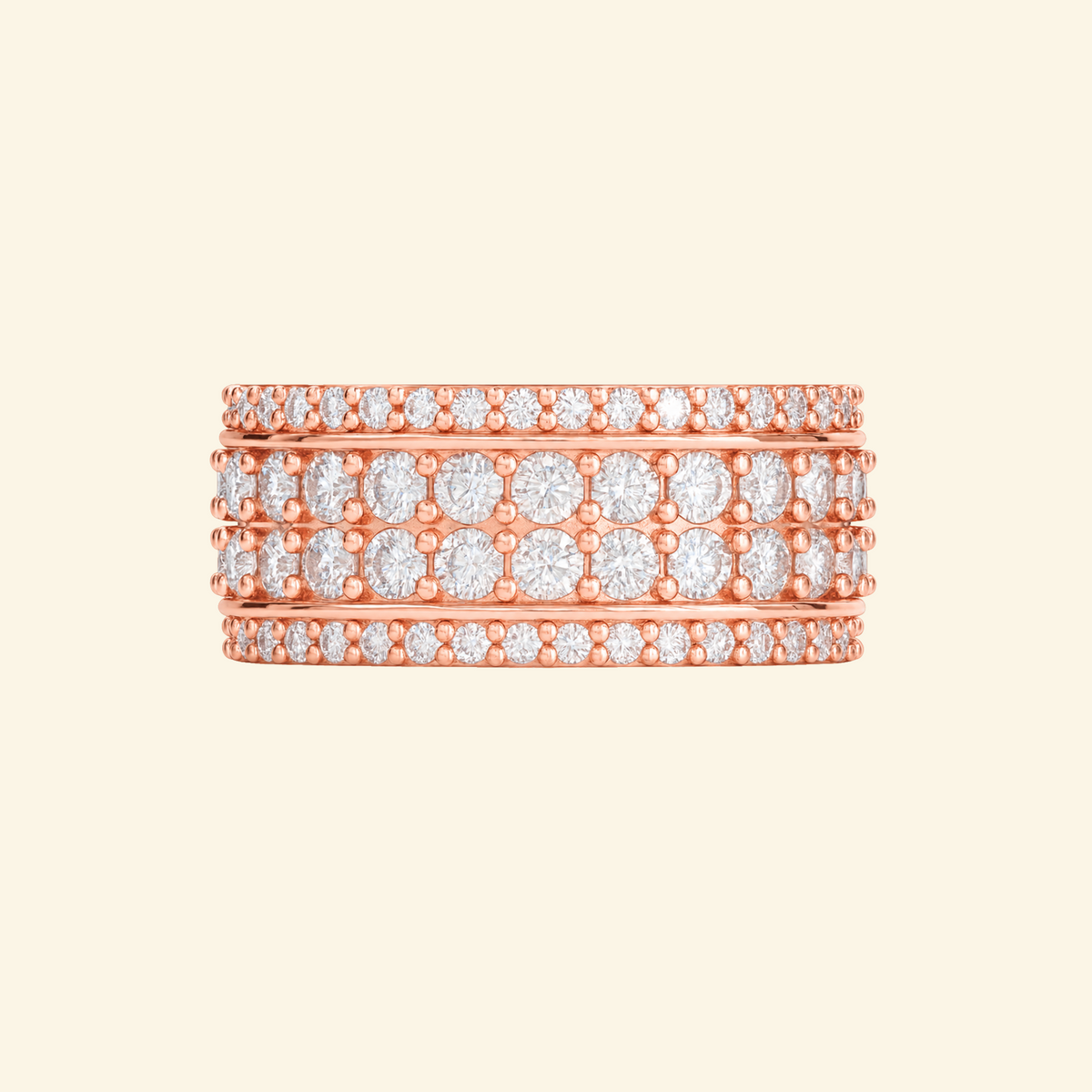 Cassian ring in rose gold, a wide band with a center row of round diamonds framed by rows of pavé
variant: rose-gold