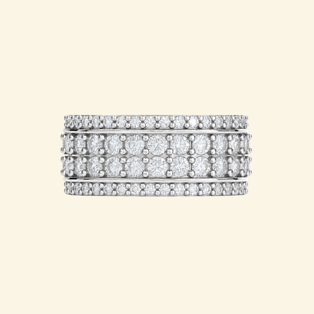 Cassian ring in silver, a wide band with a center row of round diamonds framed by rows of pavé
variant: silver