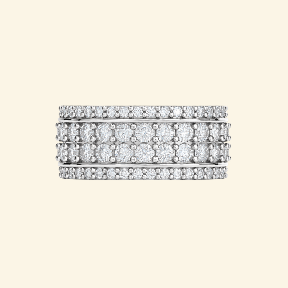 Cassian ring in silver, a wide band with a center row of round diamonds framed by rows of pavé
variant: silver