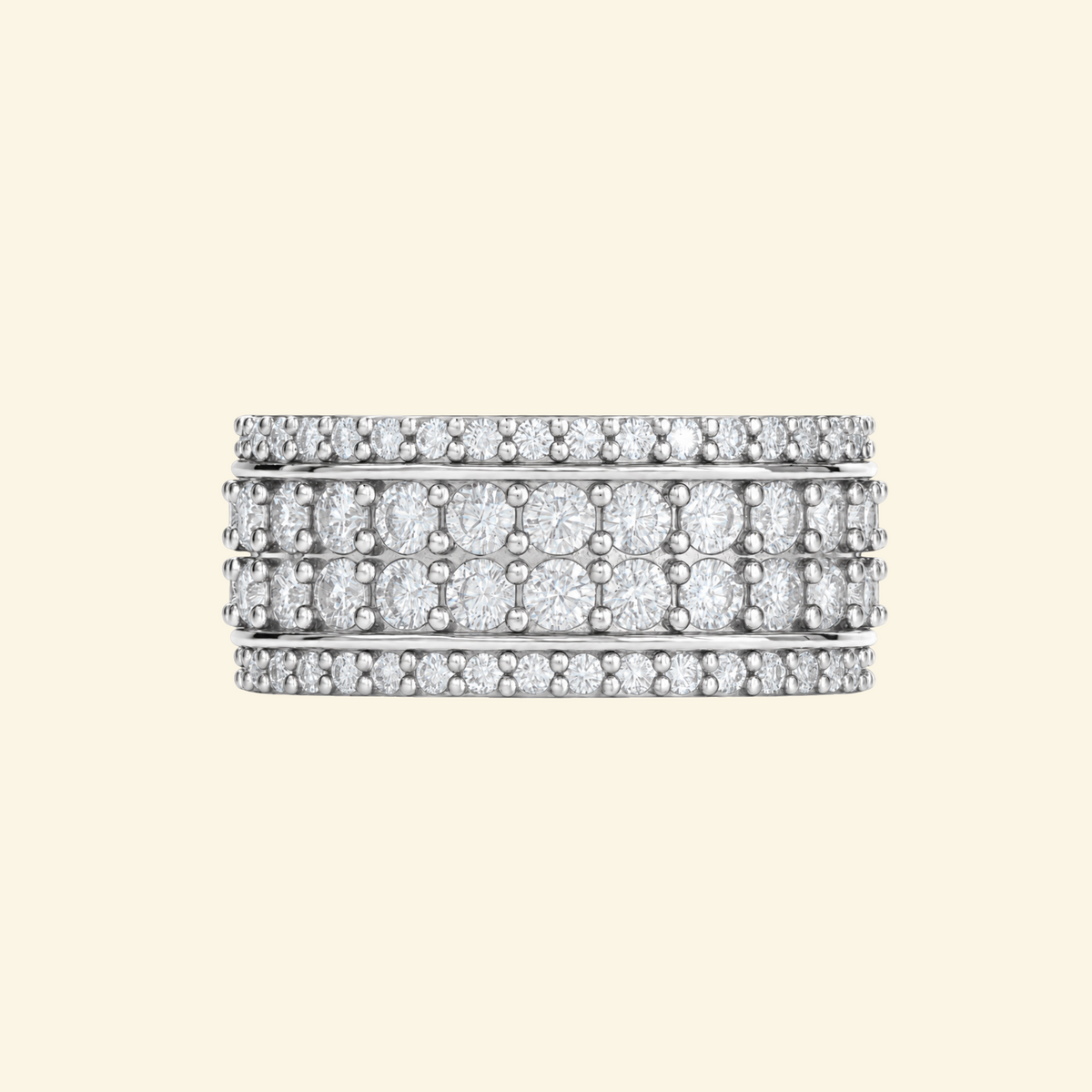 Cassian ring in white gold, a wide band with a center row of round diamonds framed by rows of pavé
variant: white-gold