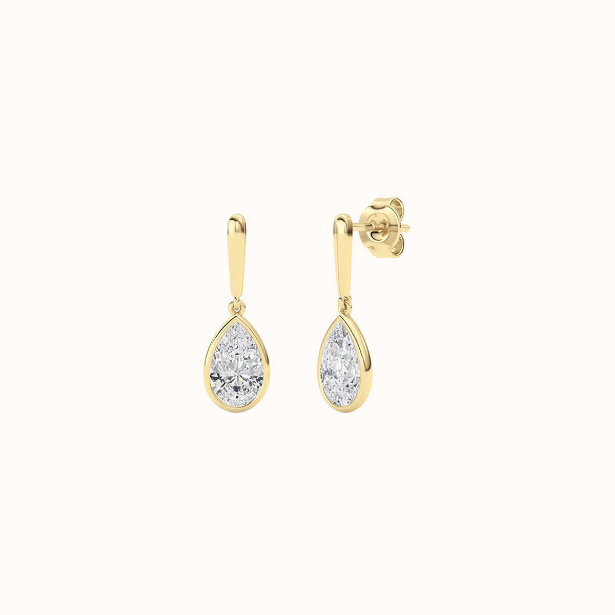 Side view of the Droplet Earrings in 14K yellow gold, showing the bezel profile and post back
variant: yellow-gold