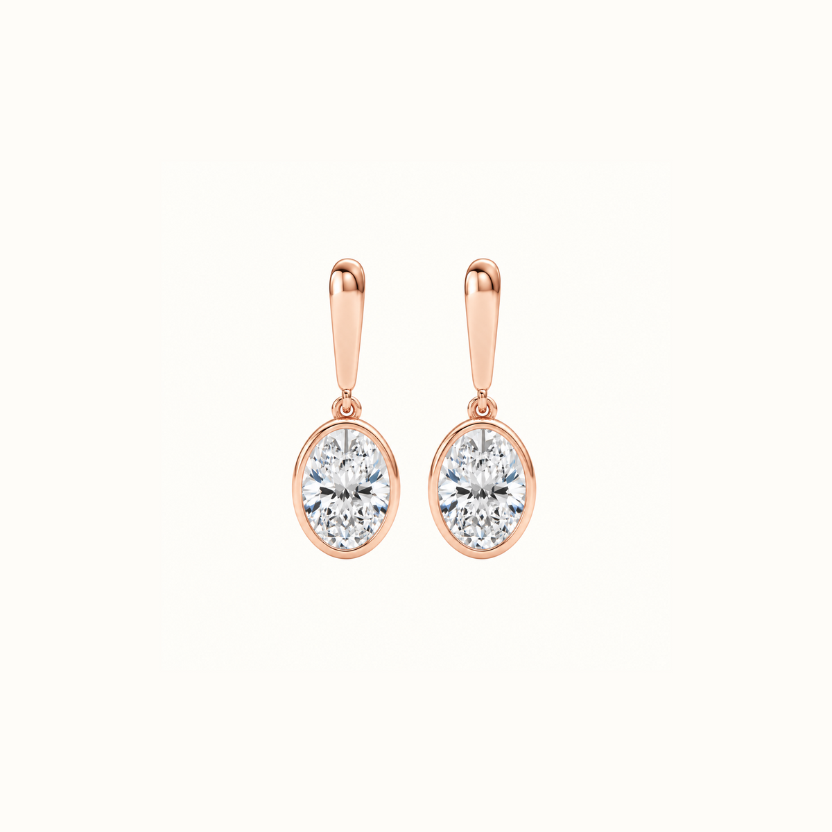 Droplet Earrings in 14K rose gold, a pair of oval lab diamonds in smooth bezels hanging from polished gold bars
variant: rose-gold