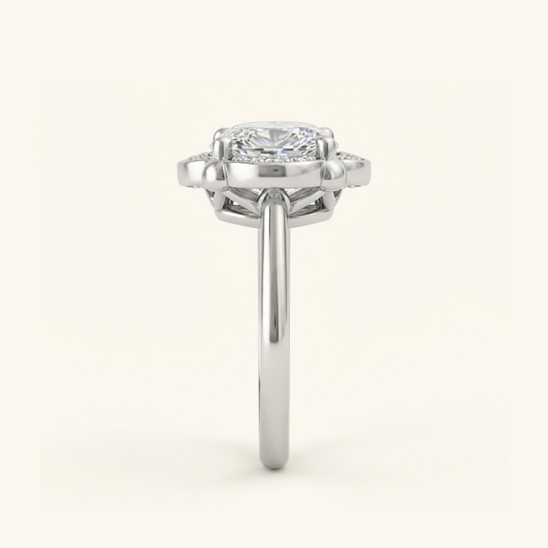 Side profile of the Elise Ring in silver or platinum, showing the scalloped halo, open gallery beneath the stone, and smooth band.

variant: silver