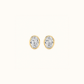 Everly bezel stud in yellow gold with an oval-cut diamond, shown from the front and side to reveal the post and butterfly back