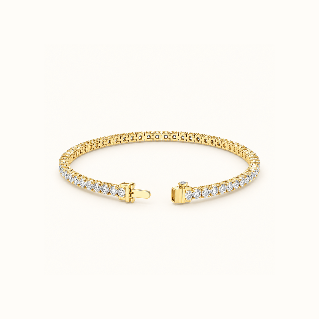Everly tennis bracelet in yellow gold laid in an open curve, showing the unbroken line of round diamonds from above
variant: yellow-gold