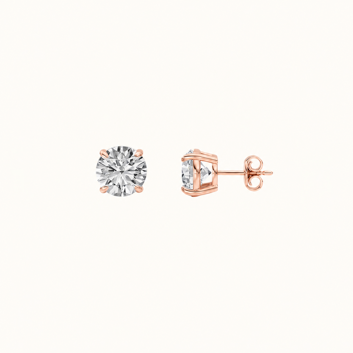 Side view of an Everly round diamond stud in 14K rose gold showing the four-prong setting, post and back
variant: rose-gold