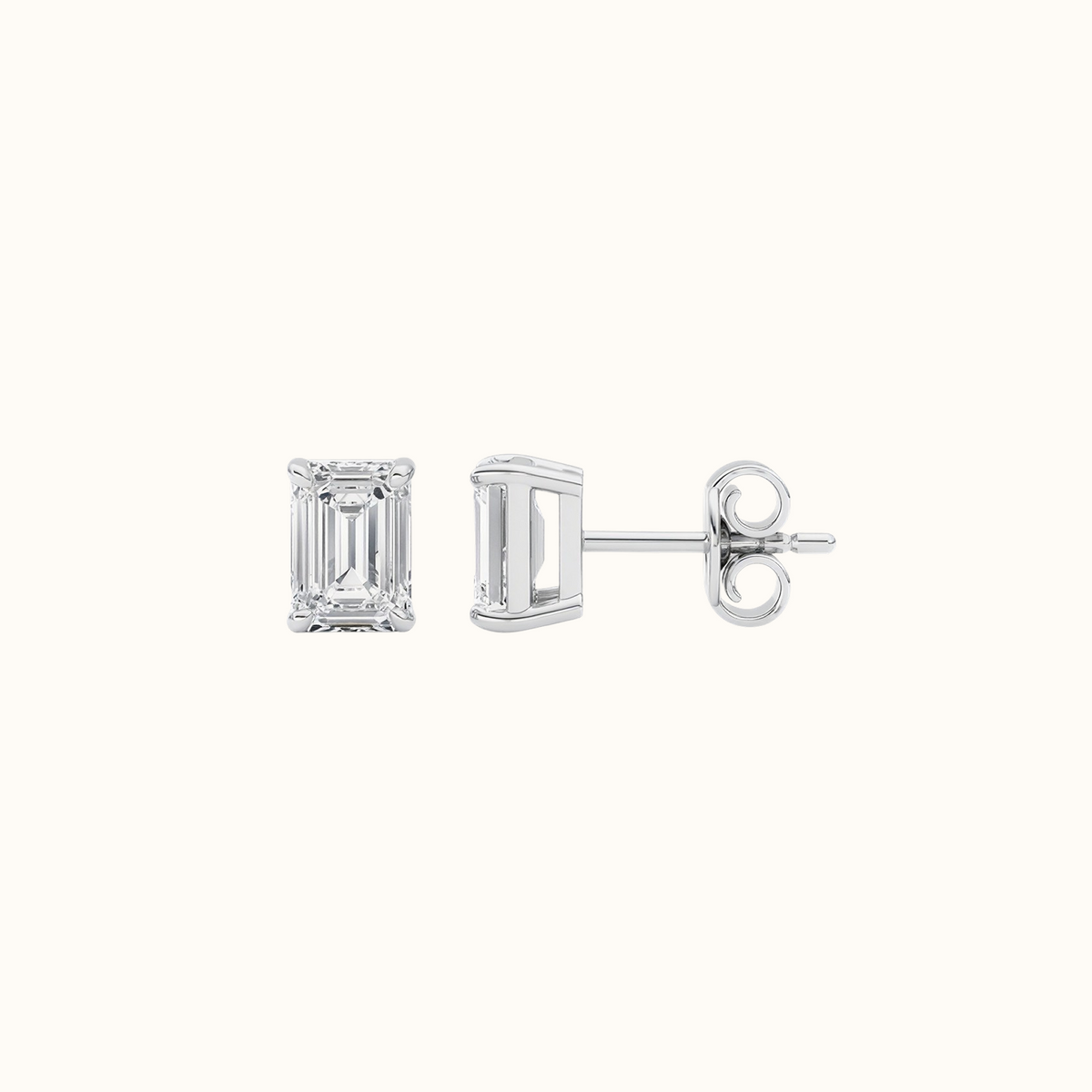Side view of an Everly emerald diamond stud in 14K white gold showing the four-prong setting, post and back
variant: white-gold