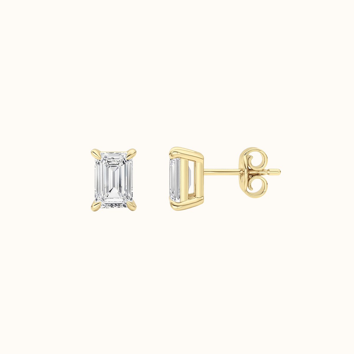 Side view of an Everly emerald diamond stud in 14K yellow gold showing the four-prong setting, post and back
variant: yellow-gold