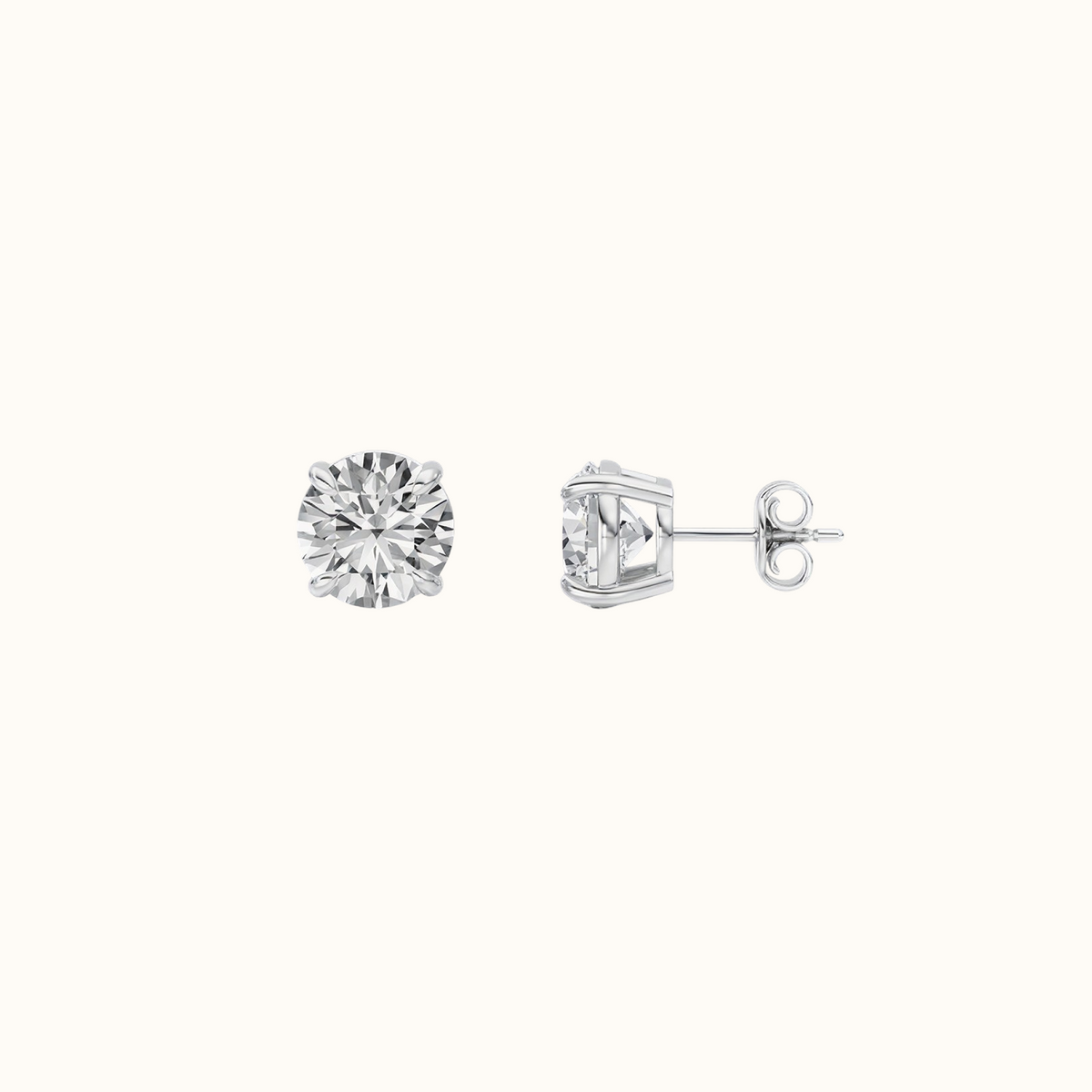 Side view of an Everly round diamond stud in sterling silver showing the four-prong setting, post and back
variant: silver
