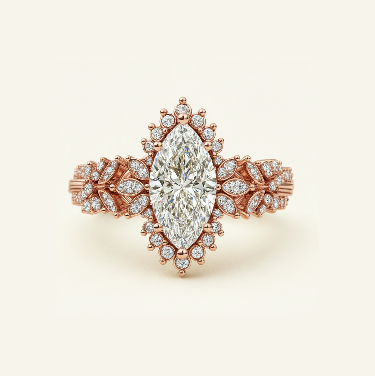 Flora Ring in rose gold with a marquise center diamond, starburst diamond halo, and leaf-inspired pavé band, on a cream background.
variant: rose-gold
