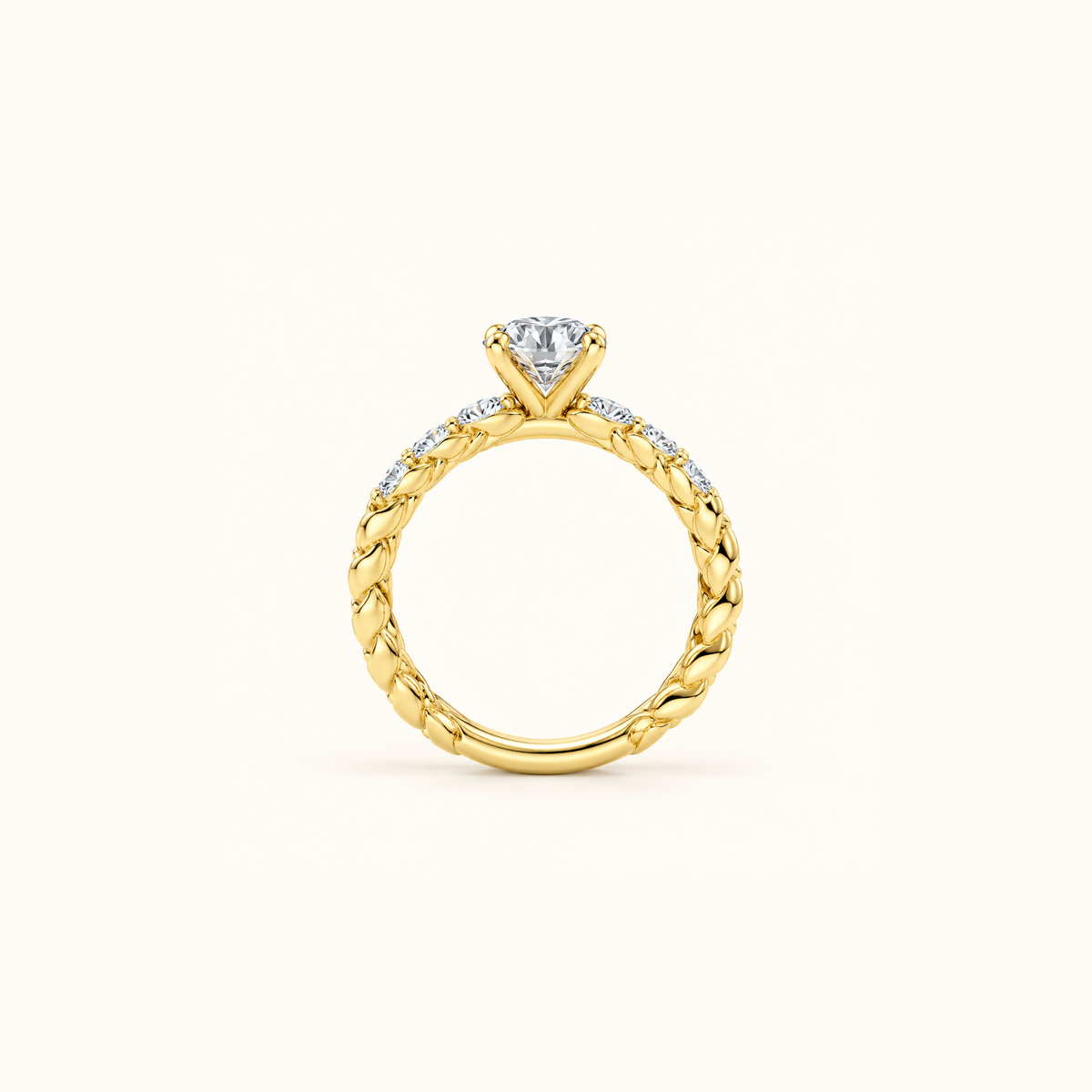Juliette Solitaire engagement ring in 14K yellow gold standing upright, showing the rope twist all the way around the band
variant: yellow-gold