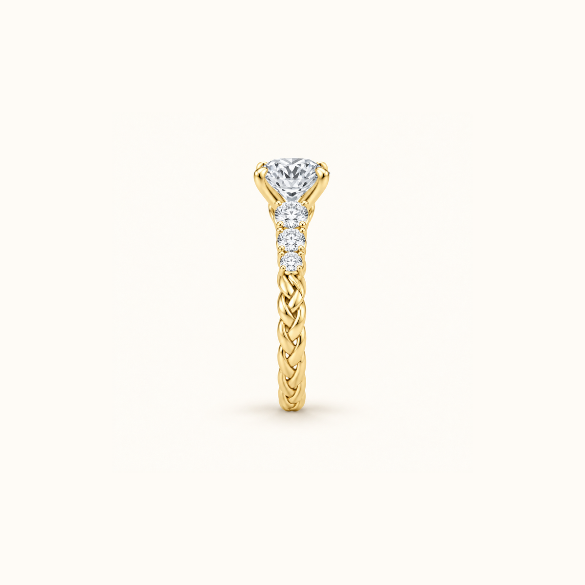 Side profile of the Juliette Solitaire engagement ring in 14K yellow gold, showing the raised prong setting
variant: yellow-gold