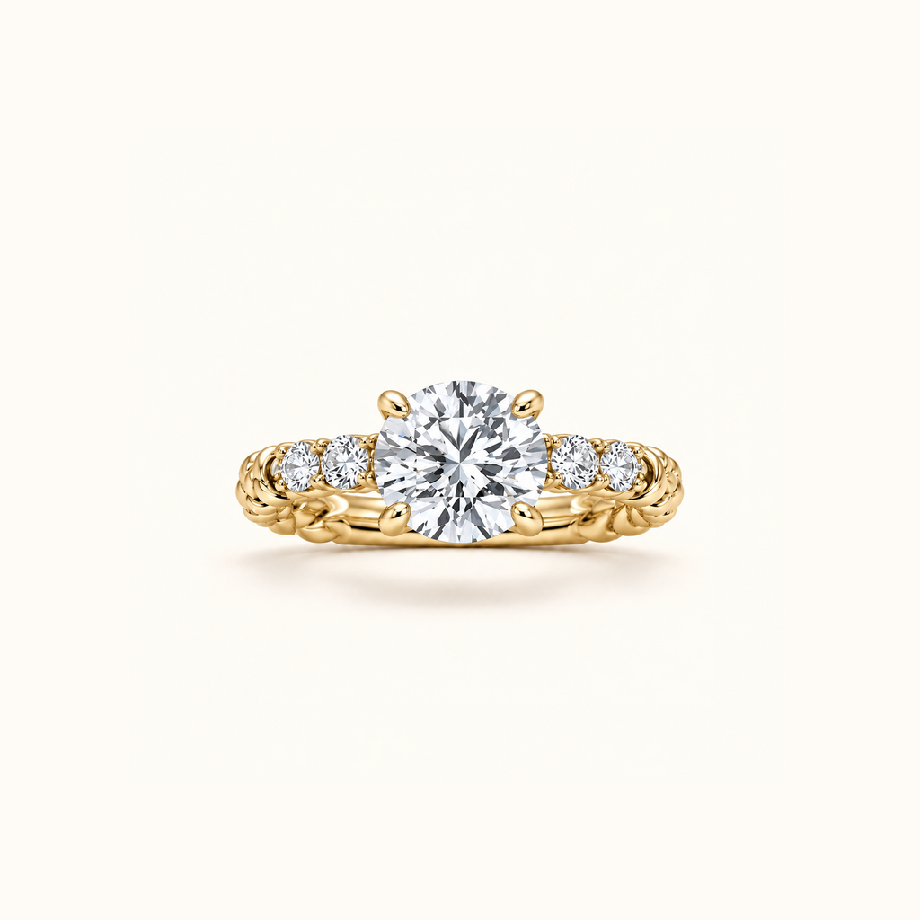 Juliette Solitaire engagement ring in 14K yellow gold with a round lab diamond on a twisted rope band set with pavé
variant: yellow-gold