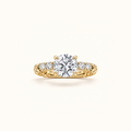 Juliette Solitaire engagement ring in 14K yellow gold with a round lab diamond on a twisted rope band set with pavé
variant: yellow-gold