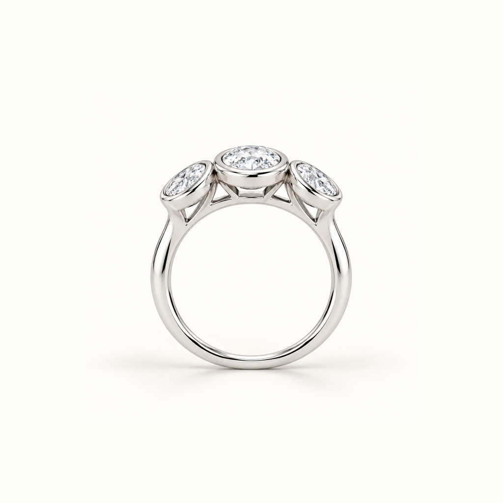 Luna Dome Ring in 14K white gold standing upright, showing the polished band and three oval stones
variant: white-gold
