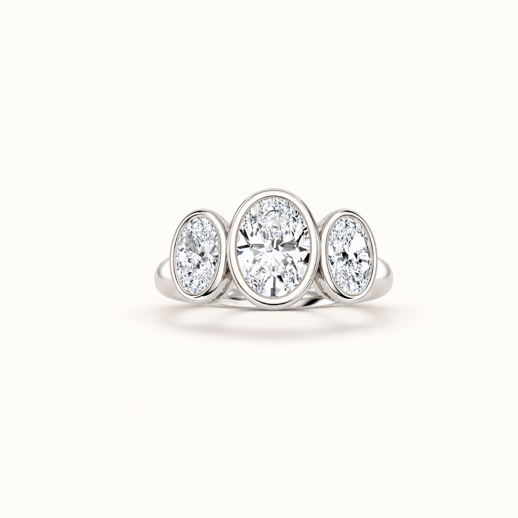 Luna Dome Ring in 14K white gold with three bezel-set oval lab diamonds in a row, the center stone largest
variant: white-gold