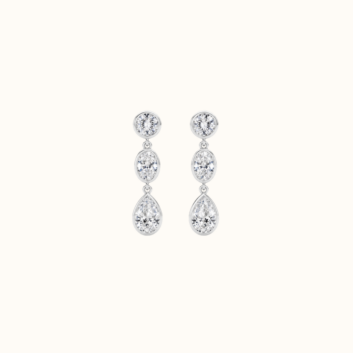 Mosaic Drops in 14K white gold, a pair of drop earrings with three bezel-set lab diamonds in mixed cuts, graduating from small to large
variant: white-gold