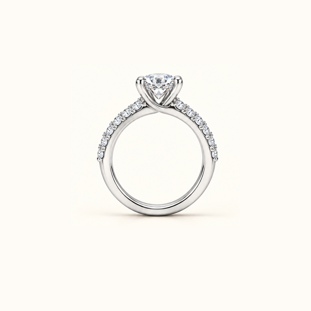 Noelle ring in white gold seen edge-on, showing the slim band profile and the height of the center setting
variant: white-gold