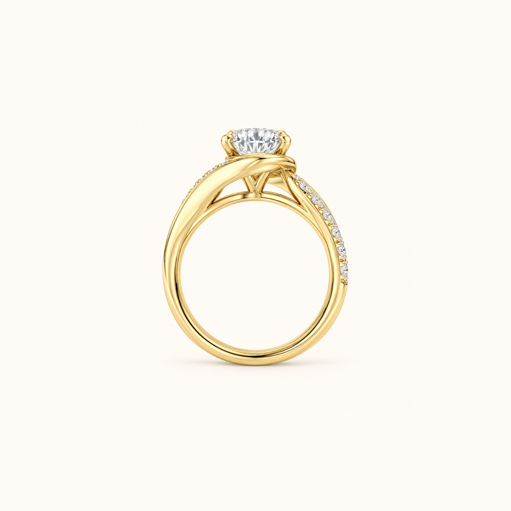 Odette Oval engagement ring in 14K yellow gold standing upright, showing the bypass band curving to meet the stone
variant: yellow-gold