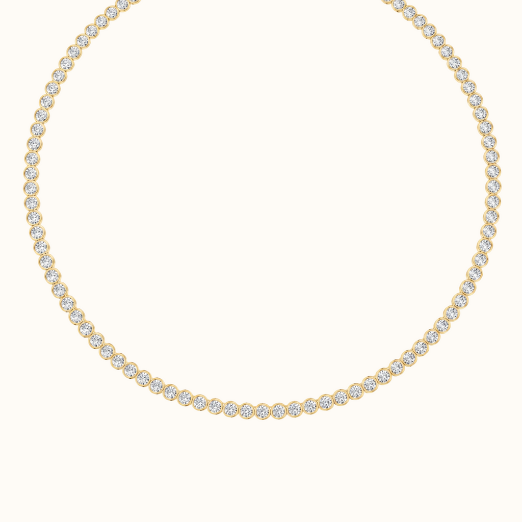Orbit Riviera tennis necklace in 14K yellow gold laid in a full circle, round lab diamonds each set in a smooth bezel
variant: yellow-gold