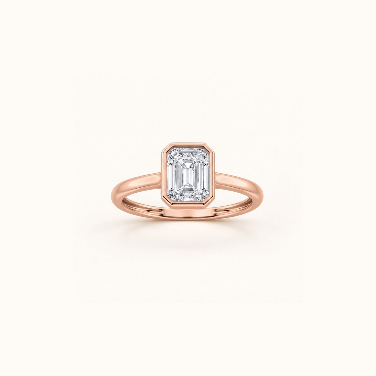 Orbit ring in 14K rose gold with a 1ct emerald diamond in a smooth bezel setting
variant: rose-gold