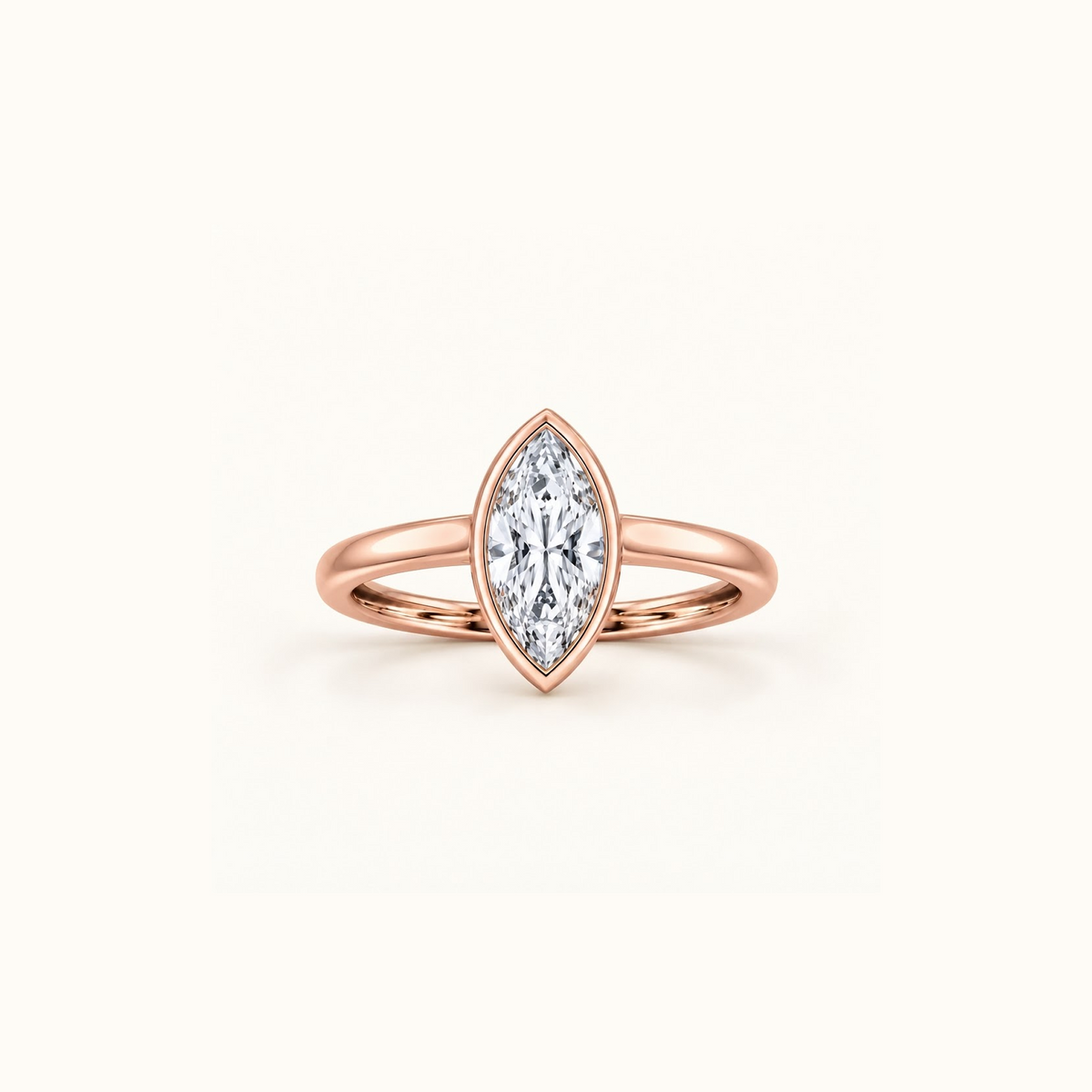 Orbit ring in 14K rose gold with a 1ct marquise diamond in a smooth bezel setting
variant: rose-gold
