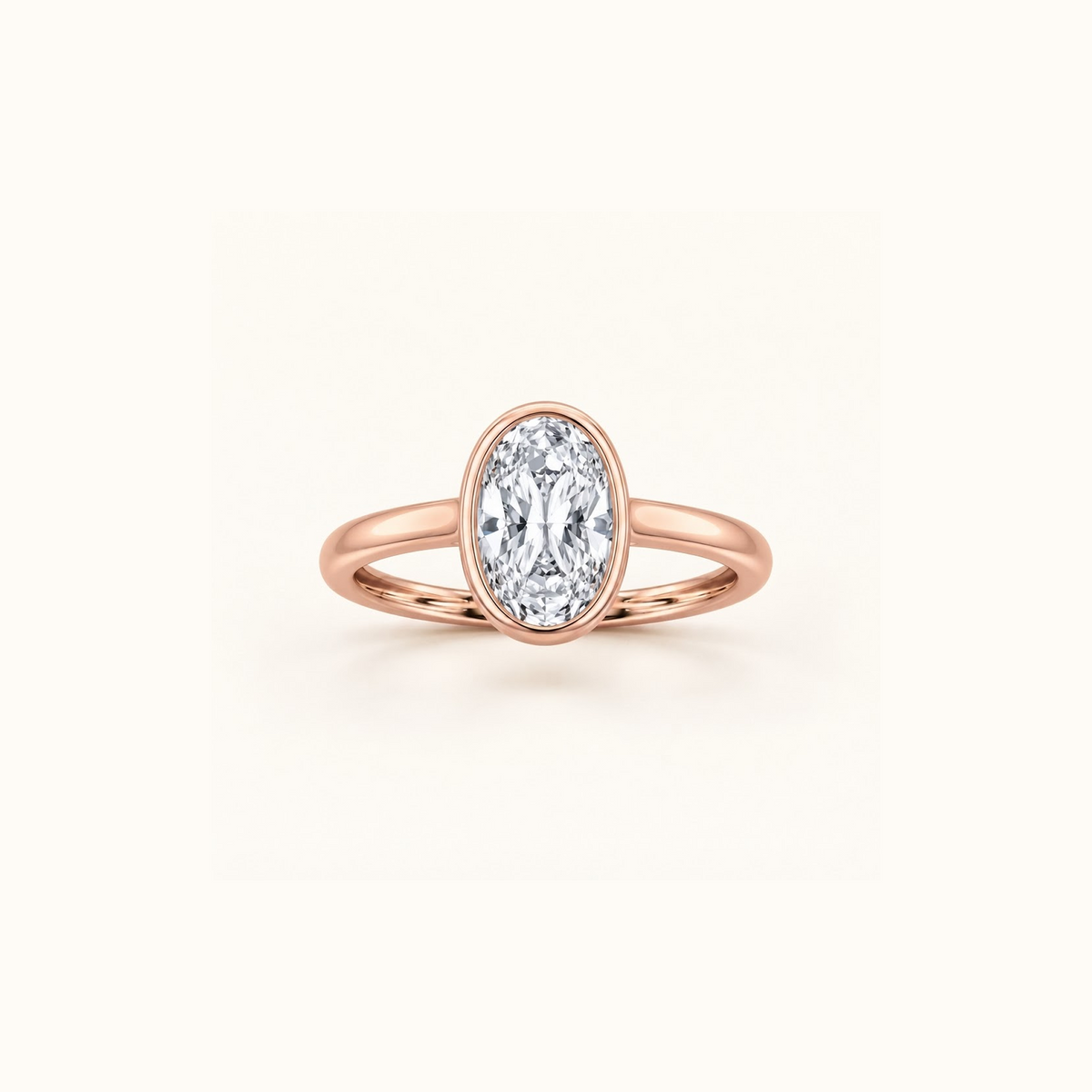 Orbit ring in 14K rose gold with a 1ct oval diamond in a smooth bezel setting
variant: rose-gold