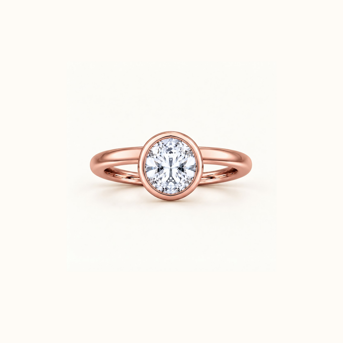 Orbit ring in 14K rose gold with a 1ct round diamond in a smooth bezel setting
variant: rose-gold