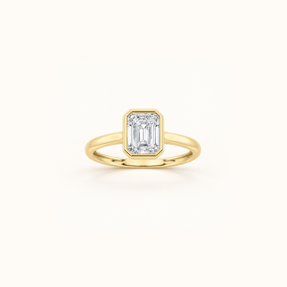 Orbit ring in 14K yellow gold with a 1ct emerald diamond in a smooth bezel setting
variant: yellow-gold