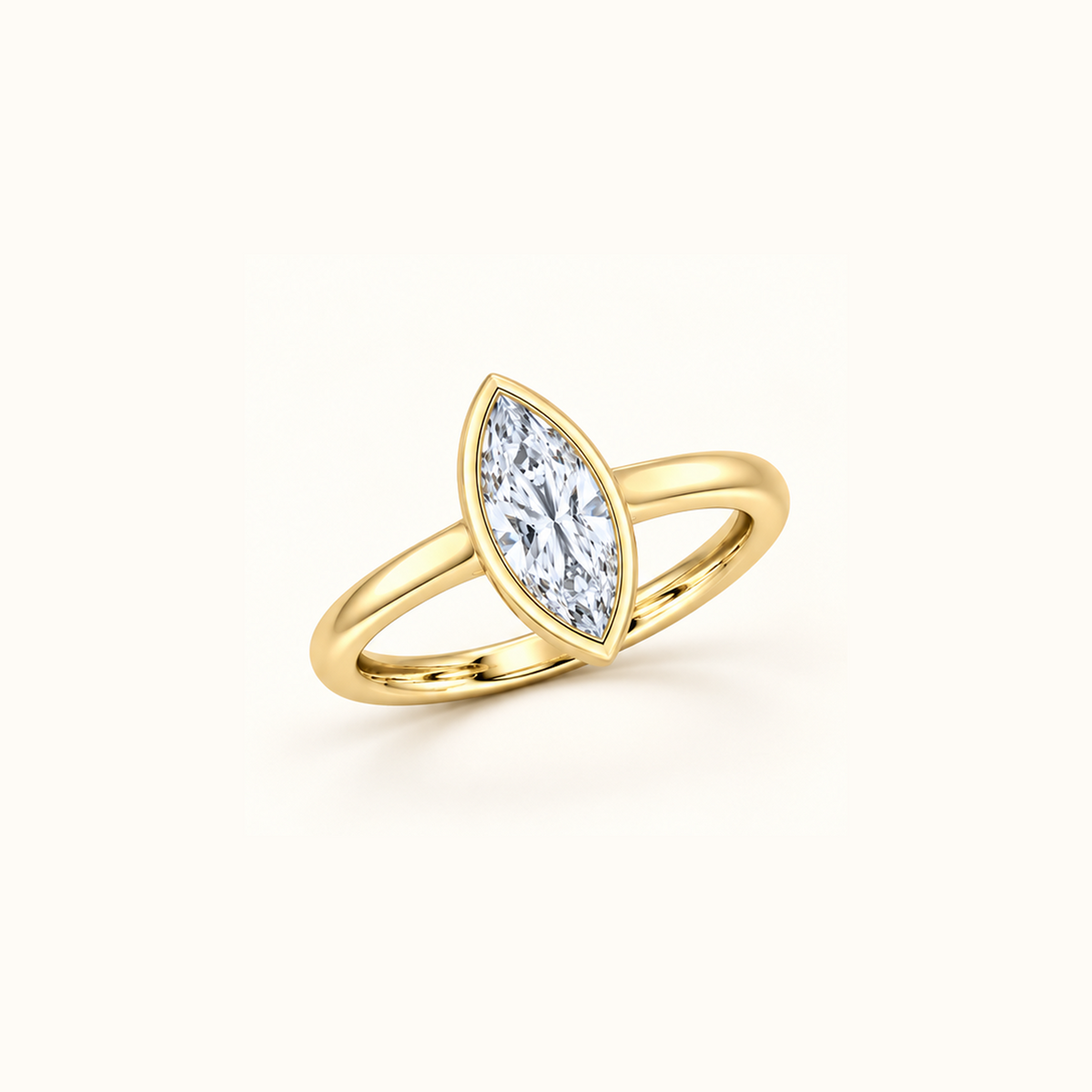 Orbit ring at an angle in 14K yellow gold with a 1ct marquise diamond in a smooth bezel setting
variant: yellow-gold