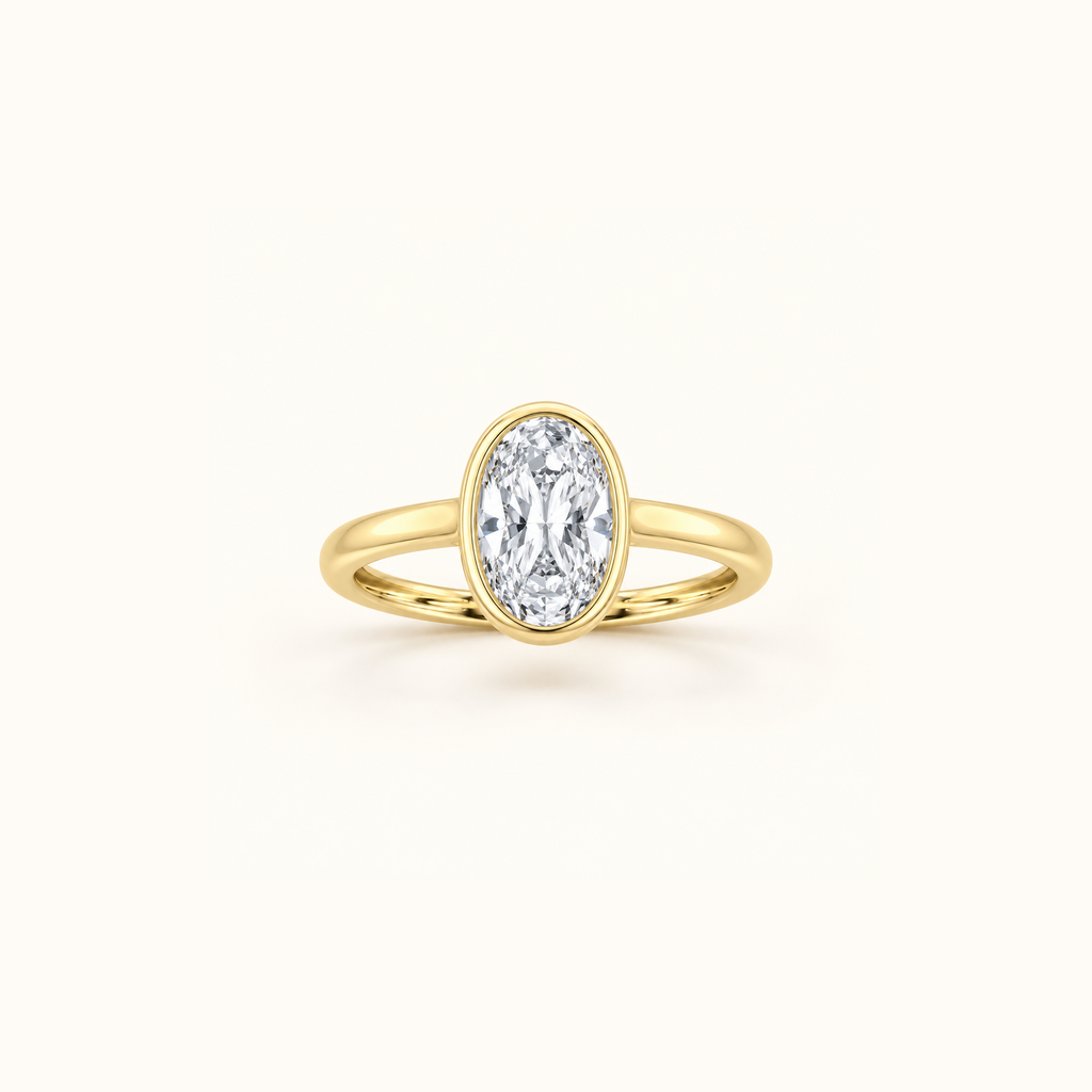 Orbit ring in 14K yellow gold with a 1ct oval diamond in a smooth bezel setting
variant: yellow-gold