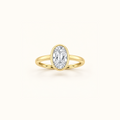 Orbit ring in 14K yellow gold with a 1ct oval diamond in a smooth bezel setting
variant: yellow-gold