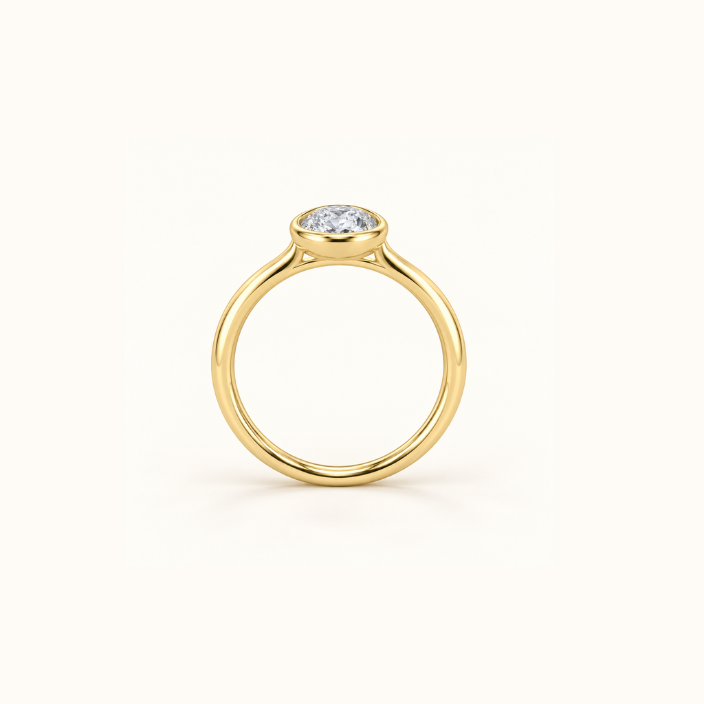 Edged view of Orbit ring in 14K yellow gold with a 1ct oval diamond in a smooth bezel setting
variant: yellow-gold