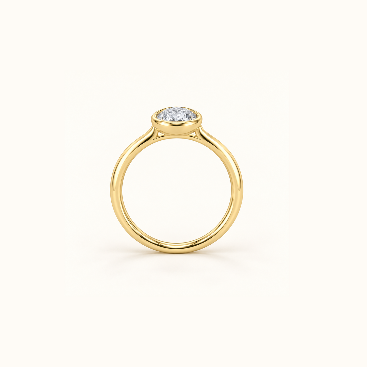 Edged view of Orbit ring in 14K yellow gold with a 1ct oval diamond in a smooth bezel setting
variant: yellow-gold