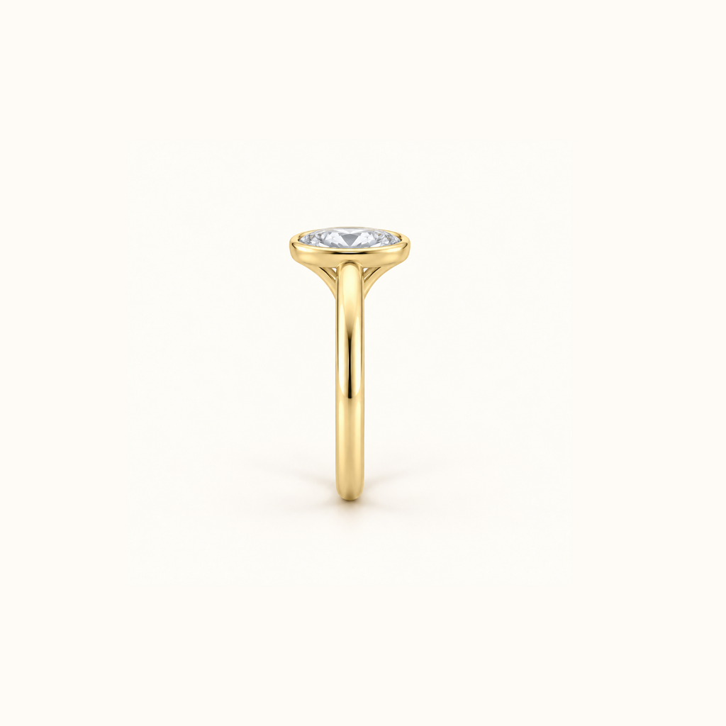 Side view of Orbit ring in 14K yellow gold with a 1ct oval diamond in a smooth bezel setting
variant: yellow-gold