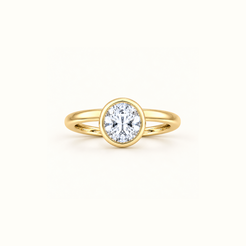 Orbit ring in 14K yellow gold with a 1ct round diamond in a smooth bezel setting
variant: yellow-gold