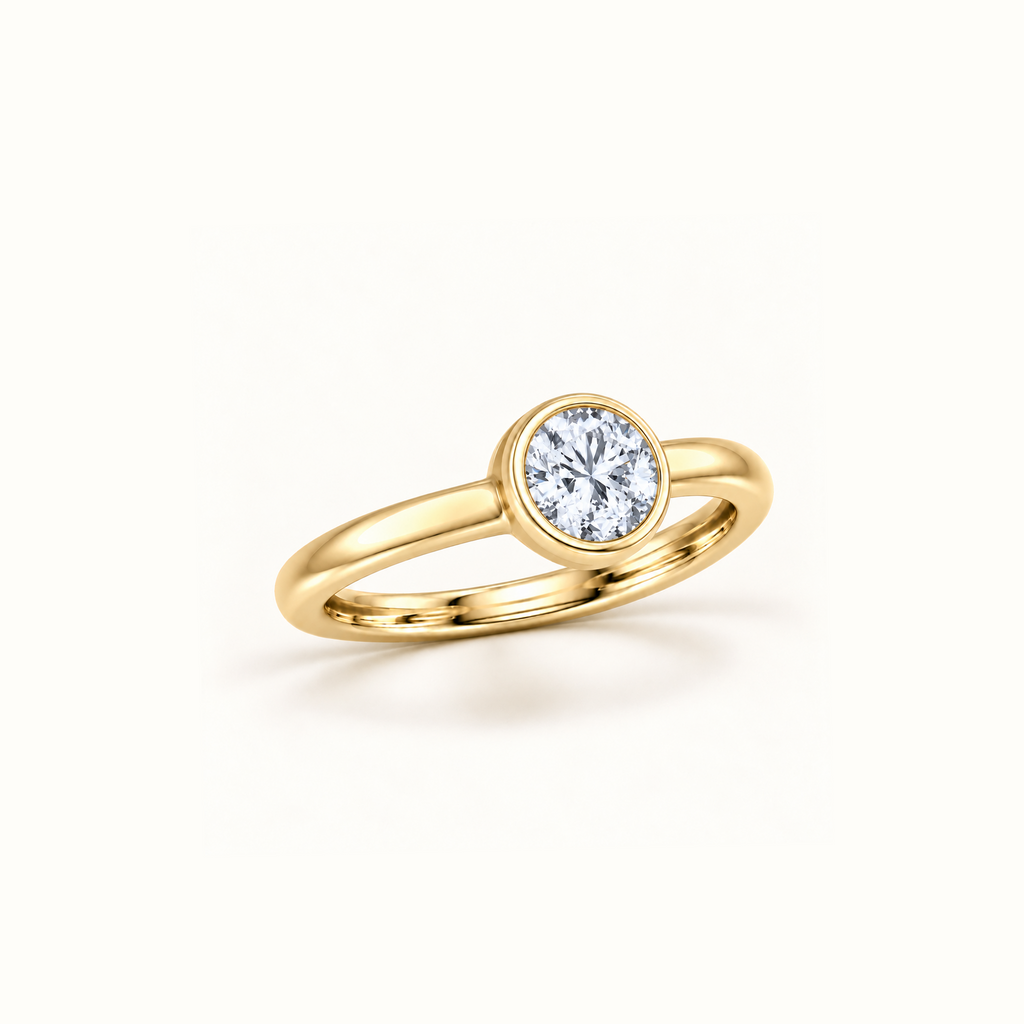 Orbit ring at an angle in 14K yellow gold with a 1ct round diamond in a smooth bezel setting
variant: yellow-gold