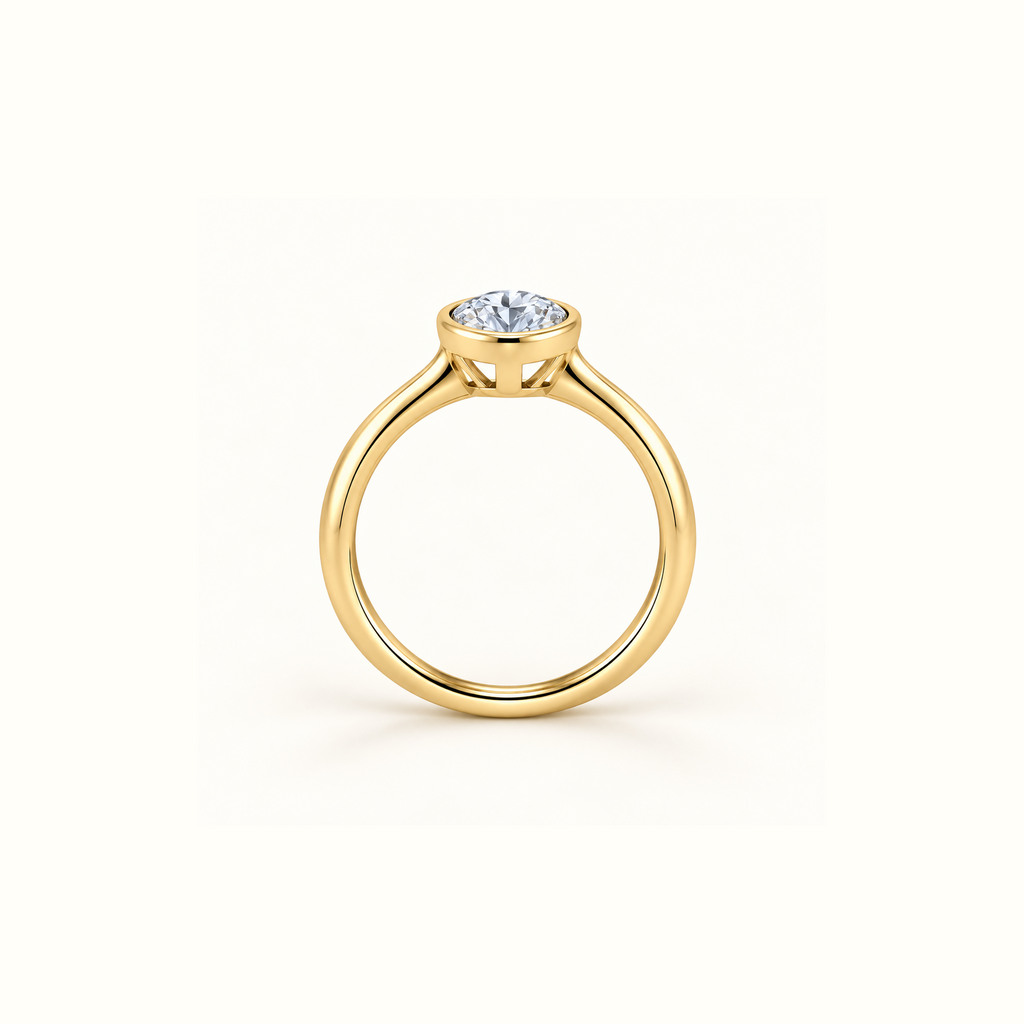 Edged view of Orbit ring in 14K yellow gold with a 1ct round diamond in a smooth bezel setting
variant: yellow-gold