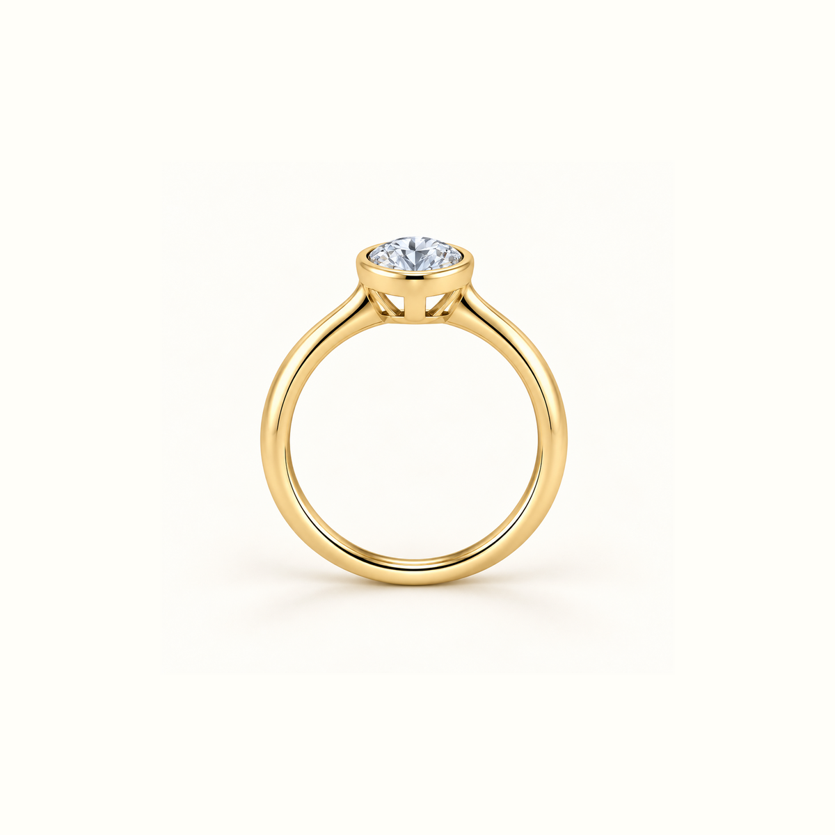 Edged view of Orbit ring in 14K yellow gold with a 1ct round diamond in a smooth bezel setting
variant: yellow-gold
