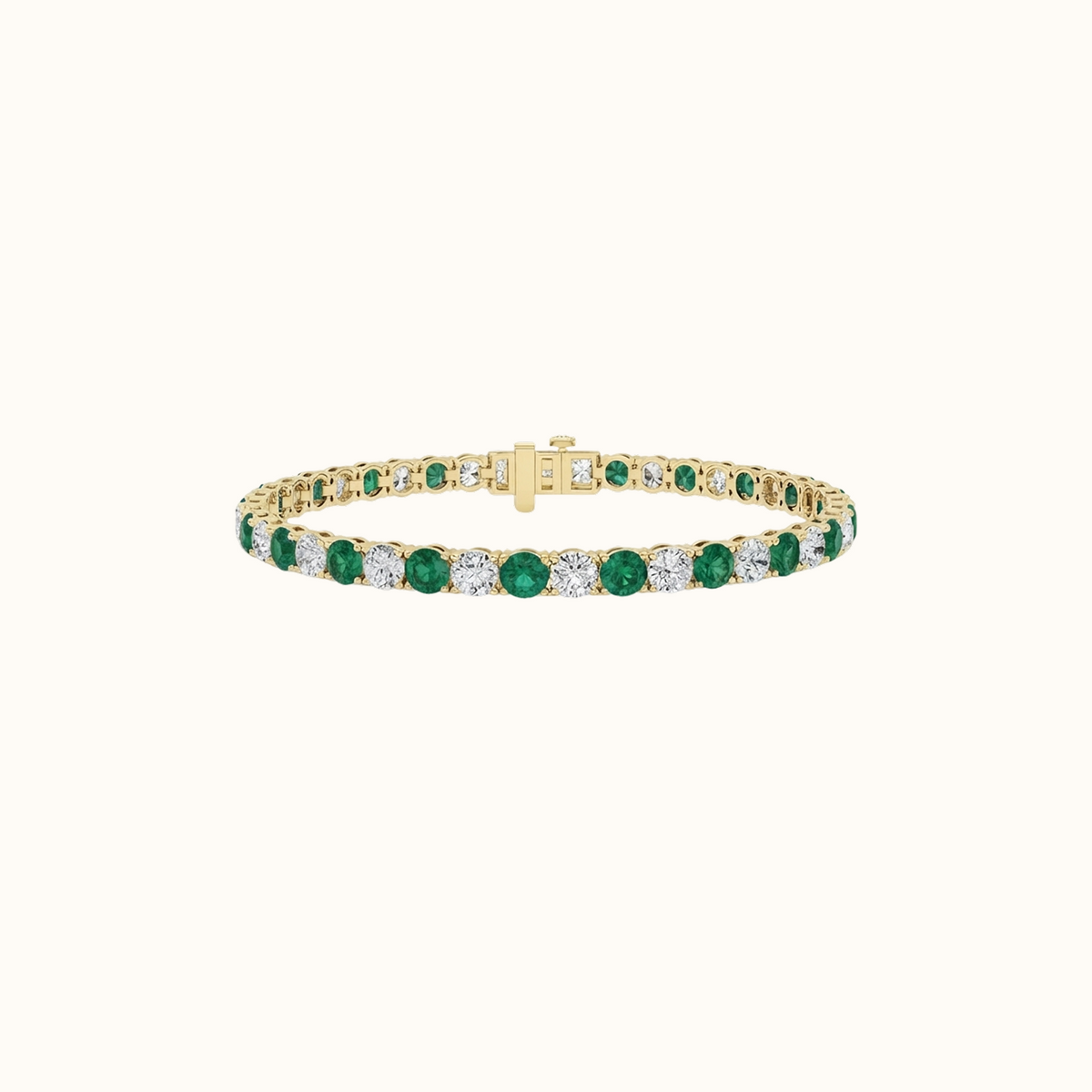 Prism Tennis Bracelet in 14K yellow gold, round lab diamonds alternating with lab-created emerald gemstones, fastened with a box clasp
variant: emerald