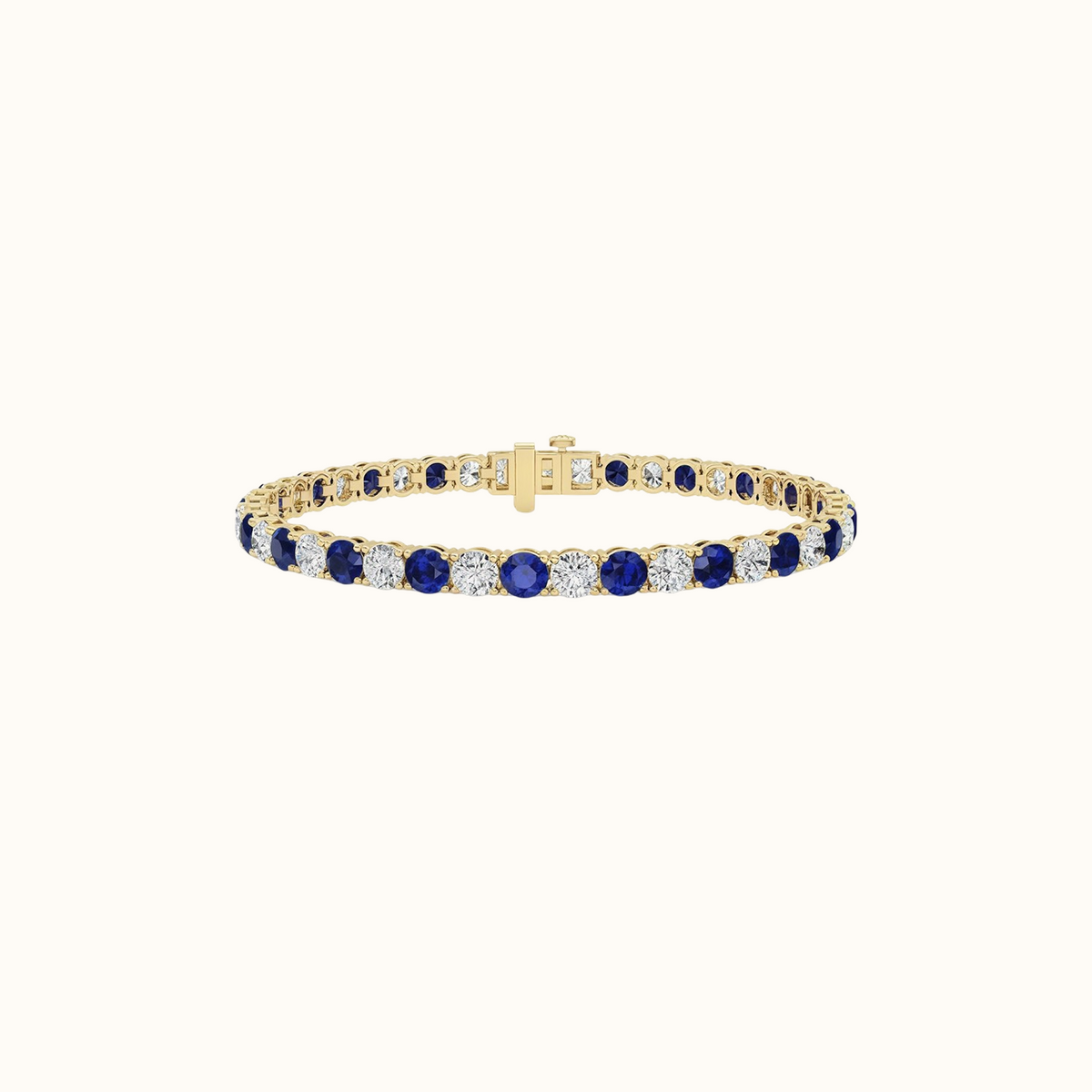 Prism Tennis Bracelet in 14K yellow gold, round lab diamonds alternating with lab-created sapphire gemstones, fastened with a box clasp
variant: sapphire