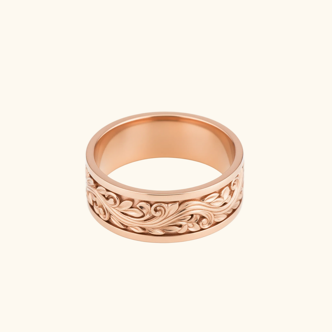Verona rose gold band ring with an intricate, raised scrollwork pattern around the outer edge, shown on a plain white background.

variant: rose-gold